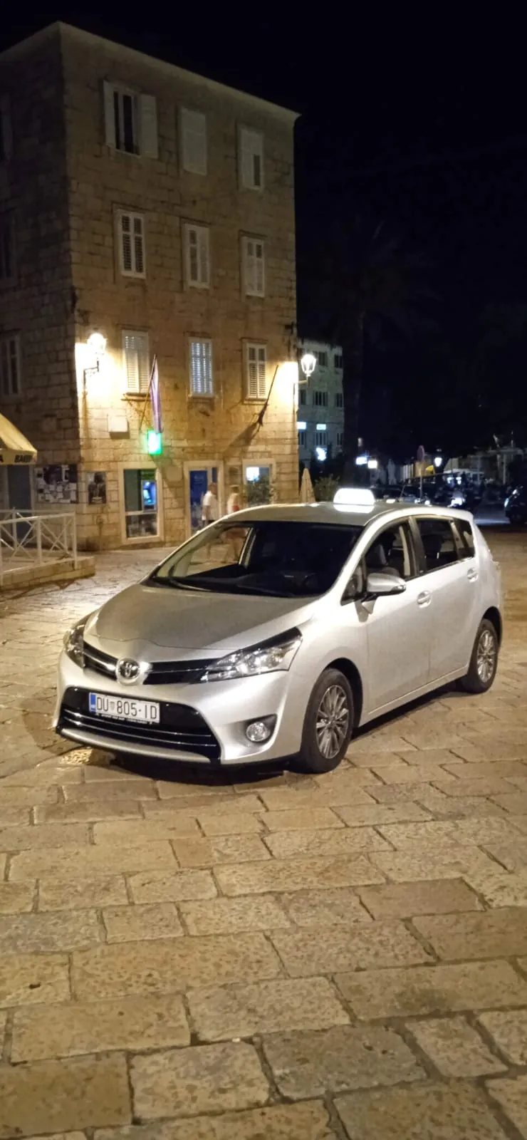 Korčula Island Taxi waiting at night on the stone square of the old town